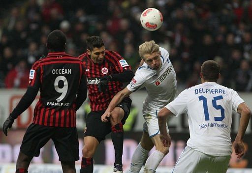 L-R: Frankfurt's Olivier Occean and Karim Matmour vie with Hoffenheim's Andreas Beck and Matthieu Delpierre